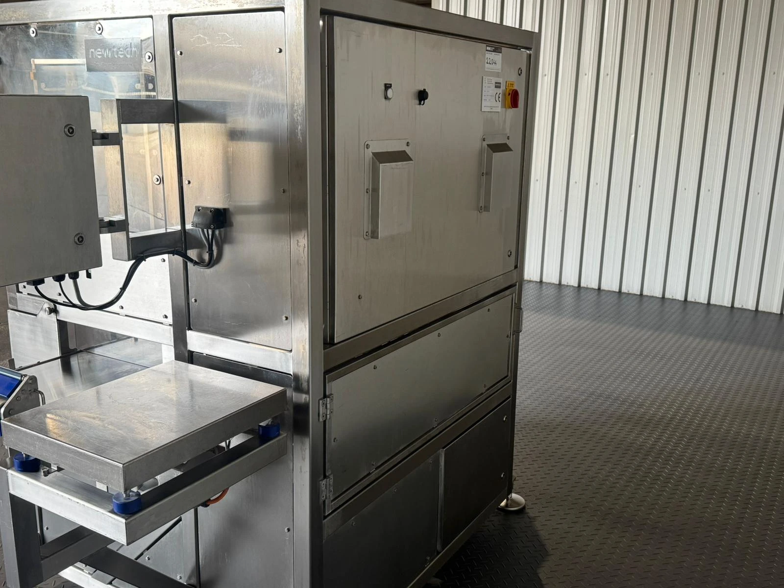 Cortador  automatizado  de queso  con control de peso marca NEWTECH